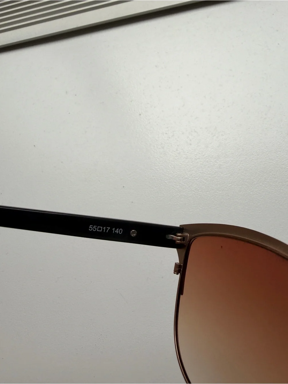 BCBGMaxAzria Black Frame Sunglasses with Rose Gradient Lenses
